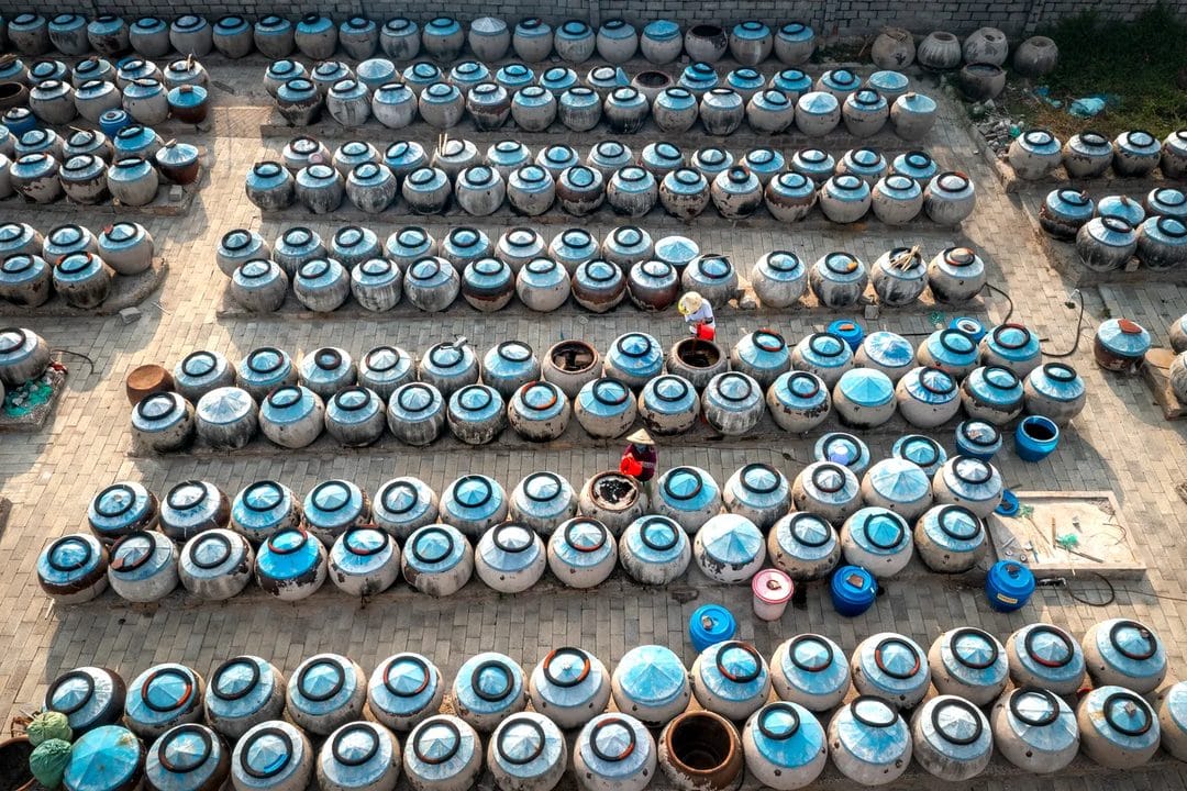 The Barrels That Never Stir: Inside Southeast Asia's Summer Fish Sauce Season